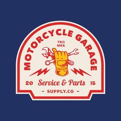 the logo for motorcycle garage on a blue background