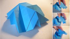 an origami elephant made out of blue paper