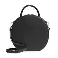 New See Pictures Style# Bjill You'll Want To Give A Round Of Applause To The Jill Circle Hat Box Crossbody For Its Ability To Carry Your Essentials In Timelessly Chic Style. Small Sized Bag; 11-1/2"W X 11"H X 3"D (Width Is Measured Across The Bottom Of Handbag); Silhouette Is Based Off 5'9" Model 3-1/2"L Top Handle; 24"L Strap Removable And Adjustable Zip Closure Silver-Tone Exterior Hardware 1 Interior Zip Pocket & 1 Slip Pocket Faux Leather Black Bags For Workwear In Spring, Black Bags For Spring Workwear, Circle Hat, Round Of Applause, Red Crossbody Bag, Steve Madden Purse, Mini Crossbody Purse, Steve Madden Handbags, Large Crossbody Bags