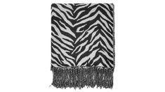 a zebra print towel with fringes on it