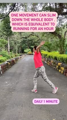 a man is doing yoga in the middle of a road with a quote above him