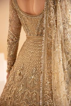 Buy Royal Golden Bridal Lehenga Frock and Dupatta Dress, a perfectly stitched masterpiece adorned with Swarovski, dabka, pearls, and cut-dana. Custom sizes Golden Nikkah Dress Pakistani Bridal, Bridal Lehenga Stitching Ideas, Gold Desi Wedding Dress, Gold Pakistani Bridal Dress, Lehenga Frock, Bridal Frock, Golden Bridal Lehenga, Golden Wedding Dress, Golden Lehenga