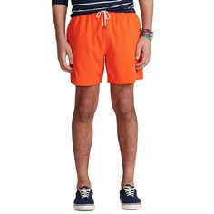 Finished with our signature embroidered Pony, these mesh-lined swim trunks by Polo Ralph Lauren delive polished Polo style—in or out of the water..Model is 6'1''/185 cm and wears a size medium.Classic Fit. All sizes have a 5¾' inseam. Size medium has a 30' waist that expands to 41' and a 10' rise..Elastic drawstring waistband.Side on-seam pockets; back right buttoned pocket.Woven 'Polo Ralph Lauren Swimwear' label at the back pocket.Signature embroidered Pony at the left hem..Mesh brief for addi Casual Swim Trunks For Water Polo And Beach Season, Casual Swim Trunks For Water Polo, Sporty Nylon Swim Trunks For Water Polo, Sporty Orange Swim Trunks For Beach Season, Water Modeling, Clothing Pants, Polo Style, Polo Ralph Lauren Mens, Swim Trunks