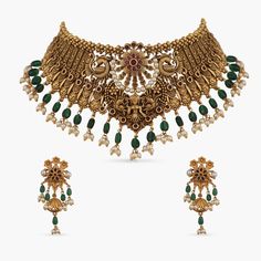 Uthpala Antique Nakshi Choker Set Ornate Kundan Necklace With Peacock Design For Wedding, Kundan Bridal Necklace With Peacock Design For Rituals, Intricate Design Choker For Diwali Celebration, Ornate Kundan Necklace With Peacock Chandbali Design, Ornate Kundan Temple Necklace With Peacock Design, Ornate Kundan Necklace With Peacock Design For Festivals, Intricate Design Choker For Diwali, Festive Temple Necklace With Intricate Design Choker, Ornate Peacock Design Jewelry For Festive Season