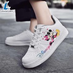 Disney Colorful Mickey Hugging Minnie AF1 Sneaker For Disney Fan Embrace timeless style and comfort with Nike Air Force 1 Shoes. Featuring a classic design with premium leather and a cushioned Air-Sole unit, these sneakers offer exceptional support and durability. The durable rubber outsole ensures excellent traction, making them perfect for everyday wear. Available in a range of colors, Air Force 1 Shoes effortlessly blend into any wardrobe while maintaining their iconic appeal. Photos Of Disne Air Force 1 Shoes, Disney Fan, Custom Nikes, Disney Inspired, Sneaker Collection, Nike Air Force 1, Intricate Details, Air Force 1, Nike Air Force