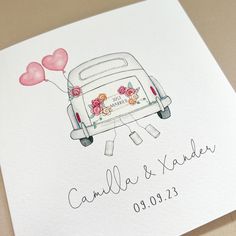 a wedding card with an image of a camper van and heart balloons on it