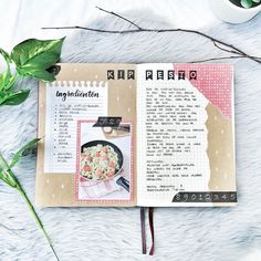 an open recipe book sitting on top of a table