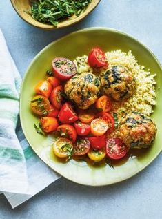 two plates filled with meatballs, rice and tomatoes