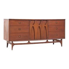 an old wooden dresser with three drawers and two doors on one side, in the style of art deco