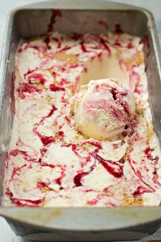 a scoop of ice cream in a metal pan