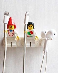 two legos are plugged in to the wall