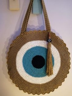 This Bohemian style ethnical handmade bag is sustainable and made with most quality %100 organic material. It is so stylish and trendy.  The color is perfect for all seasons and you can easily combine it with classic or sporty looks.  It has a good size, not much big or small. So it is useful for your everyday use or perfect as a gift for your loved ones. I can also make different colors of this bag as you wish. Let me know and I am so happy to help you with your requests and custom orders. By p Bohemian Brown Beach Bag For Gift, Brown Bohemian Straw Bag As Gift, Bohemian Brown Straw Bag As Gift, Bohemian Brown Straw Bag As A Gift, Bohemian Brown Straw Bag, Bohemian Fair Trade Crochet Bag For Beach, Handmade Brown Bohemian Straw Bag, Bohemian Brown Crochet Bag For Daily Use, Bohemian Natural Color Shoulder Bag With Fair Trade