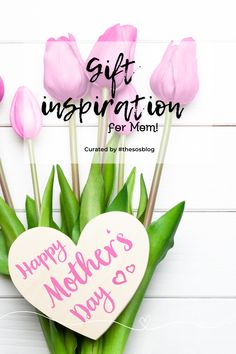 pink tulips in a vase with the words happy mother's day written on it