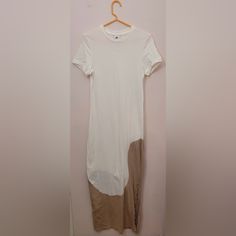 Never Worn. Women Size S. Casual White Longline Dress, Casual Longline White Dress, White Longline Midi Dress For Summer, White Stretch Cotton Midi Dress, White Longline Maxi Dress For Summer, White Stretch Short Sleeve Dress, Sporty Fitted Dress For Day Out, Casual White Maxi Dress For Day Out, Casual Fitted Cream Maxi Dress