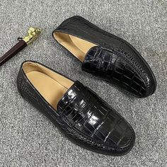 Make a statement at your next casual event with these men's moccasins. Crafted from luxurious crocodile skin upper, they exude sophistication and style. With a slip-on style, they offer convenience and ease of wear. Experience the comfort of the full-grain leather insole, coupled with the rubber outsole, ensuring maximum comfort even during prolonged wear.SpecificationsBrand Name: GeraldBlack Shoes Type: BasicOrigin: Mainland ChinaSeason: Spring/AutumnUpper Material: Crocodile SkinFit: Fits true to size, take your normal sizeModel Number: LKC-0536Closure Type: Slip-OnItem Type: casual shoesDepartment Name: AdultOutsole Material: RubberPattern Type: SolidOccasion: CasualInsole Material: Full Grain LeatherLining Material: Genuine LeatherLining-Genuine Leather Type: Cow LeatherColor: BlackMat Casual Leather Loafers With Crocodile Pattern, Business Crocodile Pattern Moccasins With Round Toe, Business Moccasins With Crocodile Pattern And Round Toe, Classic Moccasins With Crocodile Pattern And Round Toe, Luxury Crocodile Pattern Loafers With Round Toe, Business Black Loafers With Crocodile Pattern, Leather Moccasins With Crocodile Pattern, Leather Moc Toe Loafers With Crocodile Pattern, Luxury Black Moccasins With Moc Toe