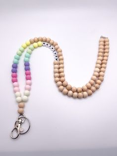 a multicolored beaded lanyard with a pair of scissors