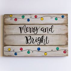 a wooden sign that says merry and bright