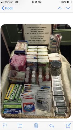 a basket filled with lots of different types of medical supplies on top of a table