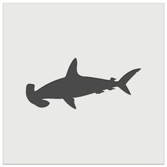 a black and white silhouette of a shark on a light gray background with the words, `