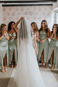 Bride getting ready for wedding with bridesmaids. Matching bridesmaids in green silk dresses inspo aesthetic. Girls and bride getting ready to marry. Best friends as bridemaids. First look of bride with bridesmaids. Getting Ready Bridal Party Photos, Bride And Maid Of Honor Getting Ready, Wedding First Look Bridesmaids, Bridesmaids And Bride Getting Ready, Bride Getting Ready With Bridesmaids, Bride And Bridesmaids Getting Ready Photos, Getting Ready With Bridesmaids, Bride And Maid Of Honor Pictures, Getting Ready Wedding Photos Bride