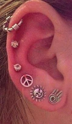 the ear is decorated with different symbols