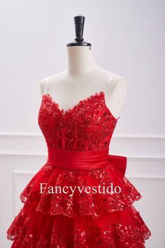 Expertly crafted with a strapless neckline and corset bodice, this stunning red dress will hug and flatter your figure. The ruffle skirt adds a touch of whimsy and the bow embellishment brings a feminine charm. Perfect for homecoming or any special occasion. ♡ SKU: FV12905 ♡ Fabric: Tulle ♡ Silhouette: A-Line ♡ Back Style: Zipper Back ♡ Embellishment: Bow Embellishment. ♡ Fully lined & Built with bra ♡ Size: US 2-16. True to the size chart. Check our Size Chart to get your correct size. ♡ Beside Red Corset Dress For Gala During Prom Season, Red Strapless Dress With Sweetheart Neckline For Banquet, Red Strapless Dress With Corset Back, Strapless Red Corset Dress With Corset Back, Red Strapless Dress With Fitted Bodice, Sleeveless Red Corset Dress For Prom, Red Sleeveless Corset Dress For Prom, Red Strapless Sweetheart Neckline Dress For Wedding, Red Strapless Dress With Sweetheart Neckline For Wedding