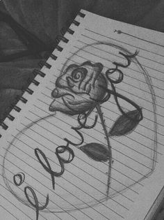 a pencil drawing of a rose with the word roses written in cursive writing