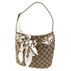 Authentic Beautiful Gucci Scarf Bag Used Not Much Wear And Tear Overall In Good Condition Brown Gucci Satchel With Gold-tone Hardware, Scarf Bag, Gucci Coated Canvas Shoulder Bag With Gold-tone Hardware, Pre-owned Brown Gucci Bag, Gucci Scarf, Gucci Bag With Gold-tone Hardware In Signature Coated Canvas, Gucci Shoulder Bag With Gold-tone Hardware In Coated Canvas, Wear And Tear, Gucci Bags