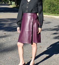 "Unlined. Back waist darts. Belt Width 1.25\". Slightly A shape. Front and back Hem Leveled. Knee Length ( 23\" at Center Front for size M). Skirt length is customizable-please leave a note if you want a different length. No Pocket. Model is wearing size M." Fitted Belted Skirt For Fall, Chic Fitted Wrap Skirt For Fall, Office Skirt With Belt Loops For Fall, Formal Fitted Wrap Skirt With Pleats, Formal Fitted Pleated Wrap Skirt, Fall Formal Belted Skirt, Elegant Fitted Wrap Skirt For Fall, Elegant Fitted Fall Wrap Skirt, Fitted Belted Pencil Skirt