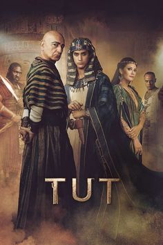 the poster for the movie tut is shown in front of an image of two men and