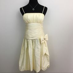 Pale Yellow Spaghetti Strap Dress Is Perfect For Any Fancy Occasion. Zipper & Eye Hook In Back & Dress Is Lined. Measurements Flat Are Approximately 21” Pit To Pit & 32.5” Long. In Excellent New Condition With No Damage. Nwt (Box C3) Champagne Dresses Long, Yellow Spaghetti Strap Dress, 2000s Prom Dress, Pale Yellow Dress, Teal Prom Dresses, Coral Gown, Pale Yellow Dresses, Satin Halter Dress, Beaded Evening Gowns