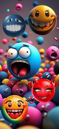 many different colored balls with faces and mouths flying through the air in front of them