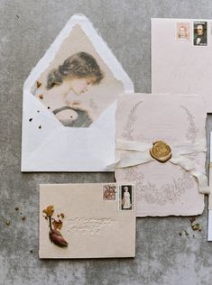 an assortment of old fashioned postcards and envelopes