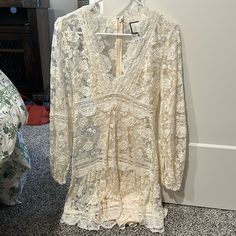 Ivory Lace Alexis Dress With Slip Included. Size Small. Never Worn. Cream Lace Dress For Brunch, Cream Long Sleeve Mini Dress For Wedding, Off White Lace Dress For Brunch, Cream Lace Long Sleeve Midi Dress, Cream Lace V-neck Mini Dress, Alexis Dress, Ivory Lace, Color White, Womens Dresses