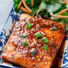 a close up of a plate of food with salmon