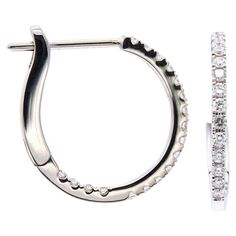 These classic and timeless small hoop earrings are made from 2.3 grams of 18 karat white gold. There are 38 round VS2, G color diamonds set in them totaling 0.31 carats. These hoops have a lever back for easy and secure wear. Small Hoop Earrings, Beaded Jewellery, Classic Earrings, Editing Service, Colored Diamonds, Beaded Jewelry, Photo Editing, Silver Bracelet, 18k Gold