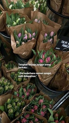 tulips and other flowers are in brown paper bags with the words, tempalah kelpang hingga organ dang berat 2