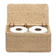 two rolls of toilet paper sitting in a woven storage box with handles on each side