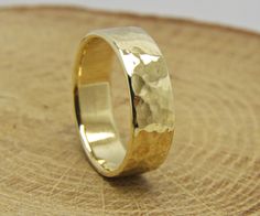 Please dont forget to provide your phone number at the checkout section , All the orders are will send by Expedited Shipping (TNT-DHL-FEDEX) Due to cod-19 , international post system does not work properly at this moment, so all the orders are send by expedited shipping. ### 10K Solid Yellow Gold Band, Solid Gold wedding Band , Yellow Gold 10K Solid Gold Wedding Band ###Goergues Wedding Band , completely handmade in my studio in Meditarian city in Turkey. ###The band has around 6-6.2mm widt and Gold Hammered Wedding Rings, Hammered Wedding Band, Wedding Band Yellow Gold, Solid Gold Wedding Band, Hammered Wedding Bands, Gold Wedding Band, Gold Band, Solid Yellow, Gold Yellow