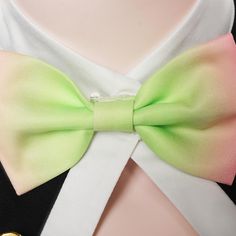 a close up of a bow tie on a mannequin