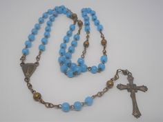 Offered is a wonderful pair of Victorian rosary beads circa 1890's. The pair is set in sterling silver with smaller size glass beads. From end-to-end, the rosary measures 13 inches making it a smaller pair - perfect for children. The rosary set is in excellent condition and will make a wonderful heirloom tradition! Please note that we only sell original antiques. We do not alter, replace, repair, or repurpose; and we do not sell reproductions. Buy with confidence that you are receiving the real Vintage Adjustable Rosary With Round Beads, Vintage Adjustable Rosary, Wedding Communion, Heirloom Traditions, The Rosary, Pocket Watch Chain, Victorian Gold, Bead Set, Silver Glass