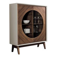 a wooden cabinet with glass doors and shelves