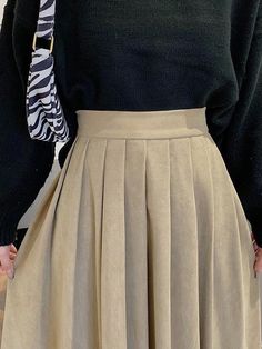 High Waist Pleated A-Line Midi Skirt | Uniqistic.com Non-stretch Pleated Skort, Non-stretch Solid Pleated Mini Skirt, Pleated Non-stretch Mini Skirt, Fitted Beige Mini Skirt Solid Color, Elegant Brown Pleated Mini Skirt, Elegant Beige Pleated Skort, Brown High-waist Pleated Mini Skirt, High-waisted Pleated Brown Skort, Casual Beige A-line Pleated Skirt