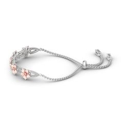 Surround her with flowers all year long. Buy that special someone this silver flower bracelet, whether she is celebrating a holiday or if she is just a lover of flowers. Crafted in two tone sterling silver, the bracelet consists from five rose gold tone blossoms and paved double chain, which shows elegance and sparkle. The bolo bracelet is easy to adjust the size to fit for her wrist to create different looks. Surprised her with this charming piece.Weight: 6.5 gWidth: 7.85 mmMaterial: 925 Silver Jeulia Jewelry, Silver Flower Bracelet, Blossom Bracelet, Bolo Bracelet, 925 Silver Bracelet, Bracelet Online, Double Chain, Gorgeous Bracelet, Flower Bracelet