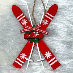 ski lift ornament with red and white snowflakes