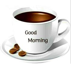 a cup of coffee with the words good morning on it