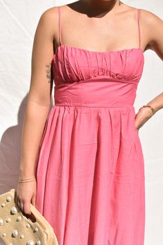 The perfect vacation dress does exist - meet our Wailea Sunset Pink Ombre Maxi Dress! Available in orange and pink, this dramatic ankle-sweeping maxi dress features gorgeous ombre fabric that fades from bright pink to dreamy blush, adjustable spaghetti straps and an empire waist. Zipper back. We're pairing with a dramatic gold earring and low bun for your best vacation look yet. 65% Cotton 35% Polyester