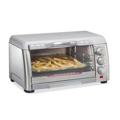 a silver toaster oven filled with lots of food