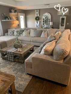 a living room filled with furniture and decor