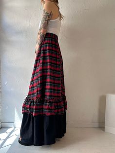 - Vintage handmade plaid maxi skirt| - Plaid like a cotton blend, black bottom tier feels like silky polyester - Elastic at the waist - No tags - XS Waist: 22" - 27" Length: 44.5" We are not responsible for lost, stolen, or damaged packages once they have been shipped. Any additional customs duties or taxes incurred on international orders are the responsibility of the buyer. Please note that our items are vintage and may have minor flaws or imperfections due to their age, which adds to their un Plaid Maxi Skirt, Black Bottom, Ladies Clothing, Womens Skirts, Black Bottoms, Maxi Skirt, Art Collection, Womens Skirt, Women's Clothing